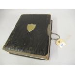 Victorian leather bound photograph album with simulated wood cover