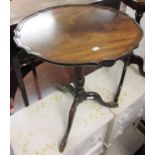Mahogany wine table with shaped top and turned support with tripod base, together with a pair of