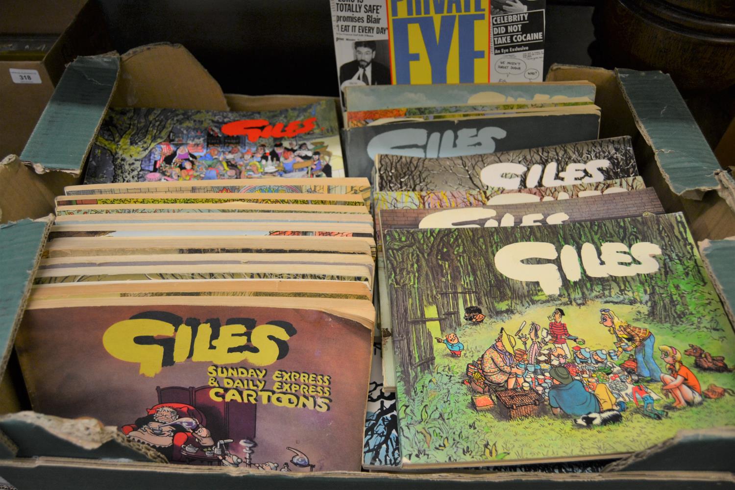 Near complete set of Giles Cartoon books together with a quantity of Private Eye annuals