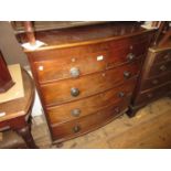 Victorian mahogany bow fronted chest of two short and three long drawers with knob handles, raised