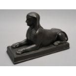 Late 18th / early 19th Century Wedgwood black Jasper model of a sphinx on a rectangular plinth base,