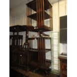 Pair of Bevan & Funnell reproduction mahogany revolving bookcases, each with a crossbanded and