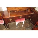 Late 19th / early 20th Century writing / dressing table having moulded top above three drawers