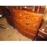 Victorian mahogany bow front chest of two short and three long drawers with knob handles and splay