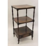 George IV rectangular mahogany three tier whatnot on turned supports with single drawer to base