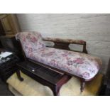 Late 19th Century walnut and upholstered chaise longue on turned supports