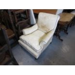 Late 19th Century upholstered elbow chair on low turned front supports, stamped 2464WB to rear foot