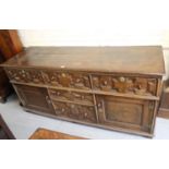 Late 17th Century oak dresser base, the plank top with a combination of four geometric moulded panel