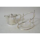 Elkington and Company silver plated ham stand, together with an Embassy oval plated teapot
