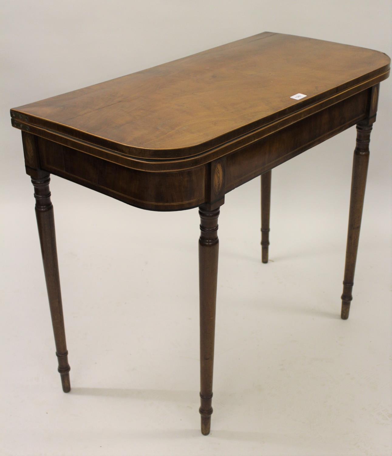 George III mahogany D-shaped fold-over card table (damages), 36ins wide