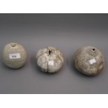 Alan Wallwork (1931 - 2019), pebble form vase, 5ins together with two sea urchin vases, 4.5ins and