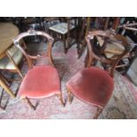 Pair of Victorian carved walnut wing back side chairs with overstuffed seats and turned front