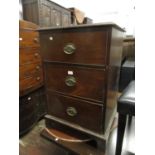 19th Century mahogany three drawer chest with oval brass handles raised on bracket feet ( back