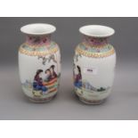 Pair of Chinese Republic period vases of baluster form decorated with groups of seated figures and