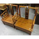 Pair of mid 20th Century Chinese low seat elbow chairs, 27ins high