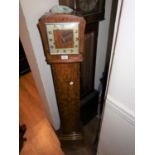 1920's Walnut cased Grandmother clock having silvered dial with three train Westminster chiming