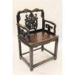 Late 19th / early 20th Century Chinese hardwood open armchair, the pierced and carved back above a