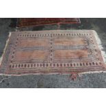 Pakistan Turkoman pattern rug, approximately 60ins x 36ins (at fault) together with a Serabend