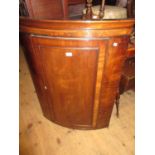 George III mahogany and inlaid bow fronted hanging corner cabinet
