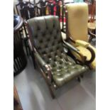 Green button leather upholstered open armchair