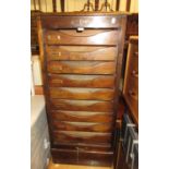 Early 20th Century stained beechwood index cabinet with a tambour front enclosing sliding trays,