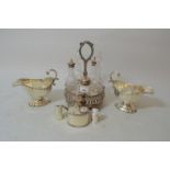 Silver plated cruet set with five cut glass bottles, pair of plated sauce boats, plated oval drum