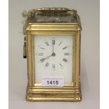 Late 19th / early 20th Century French gilt bronze carriage clock having enamel dial with Roman