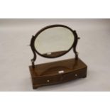 Small George III mahogany boxwood line inlaid and ivory mounted oval swing frame toilet mirror