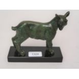 Small late 19th / early 20th Century green patinated bronze figure of a kid goat, 6ins wide