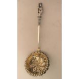 Victorian Sheffield silver sugar sifter spoon with embossed and gilt bowl and an Apostle mounted