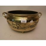 19th Century Chinese polished bronze two handled shallow bowl decorated in relief with landscapes (