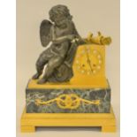 19th Century French dark patinated and gilt bronze and marble mantel clock, surmounted by a figure