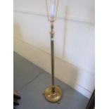 Brass oil lamp standard adapted for use with electricity