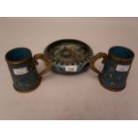 Chinese cloisonne bowl decorated with dragons on a blue ground and a pair of cloisonne tapering mugs