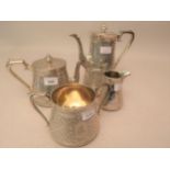 Victorian London silver four piece teaset having unusual engraved decoration and Thompson family