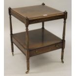 Reproduction mahogany lamp table with pull-out slide and single drawer on turned supports