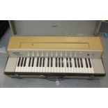 Hohner 1960's Symphonic 31 portable organ, together with an HH amplifier