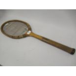 Antique wooden tennis racket with original gut stringing (at fault)