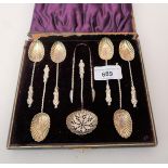 Cased set of six Victorian Birmingham silver Apostle coffee spoons with tongs and sifter spoon