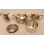 Two silver cream jugs, two silver sugar basins and silver dressing table jar cover