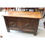 18th Century oak coffer, the two panel front with geometric mouldings , raised on style feet (with