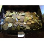 Black wooden box containing a collection of World coins