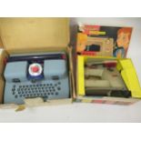 Child's Vulcan Countess sewing machine together with a Marx children's typewriter in original box