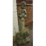 20th Century weathered concrete garden ornament of a faun playing pipes on a column