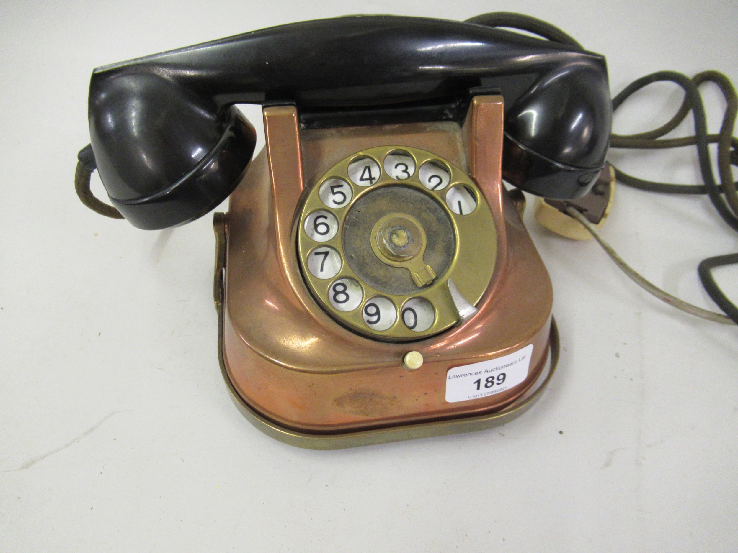 Early to mid 20th Century copper mounted, brass and Bakelite telephone