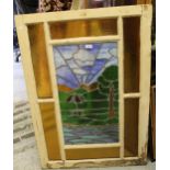 Mid 20th Century coloured leaded glass window, view of a landscape with orange glass border, 43ins x