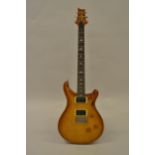 2004 PRS Custom 24 electric guitar, serial no. 4 90212, with ten grade top in sunburst finish, in