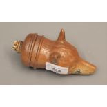 Unusual 19th Century stoneware spirit flask in the form of a fox's head, 5.25ins wide Various issues