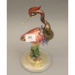 Murano glass figure of a bird, on circular plinth base, 9ins high