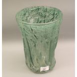 Green glass flared rim vase relief moulded with a forest scene (chip to foot rim), 10ins high